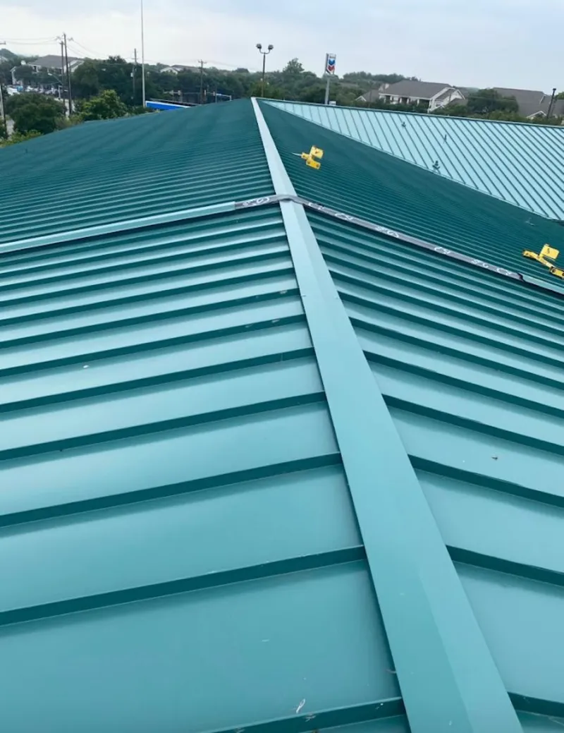 Green commercial metal roof ridge and valley for Metal Roof Repair in Rhinelander